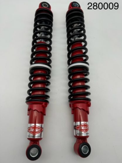 Betor shock absorber, red body, black spring.
